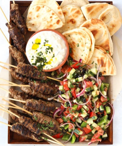 Lamb kofta kebabs recipe with flatbreads and Greek salad and tzatziki