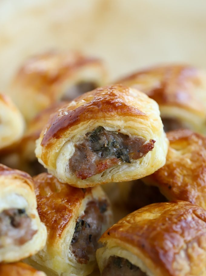 Close up of the edge of a sausage packed pastry rolls