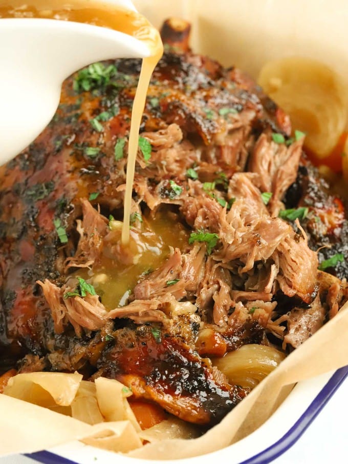 Slow cooker roast lamb with gravy it cooks in.