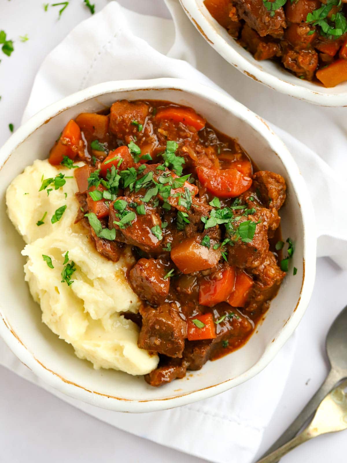Easy beef stew recipe made in the slow cooker with carrots and swede