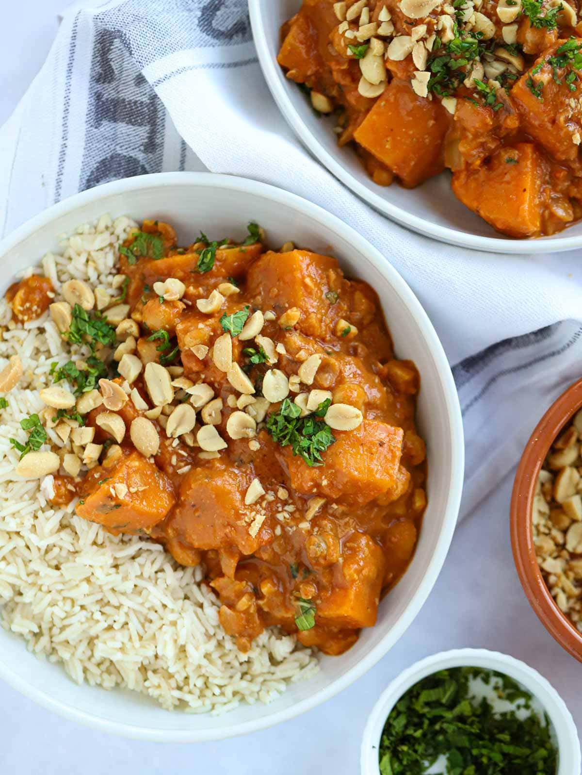 Slow cooker sweet potato chicken pea and peanut butter stew vegan recipe.