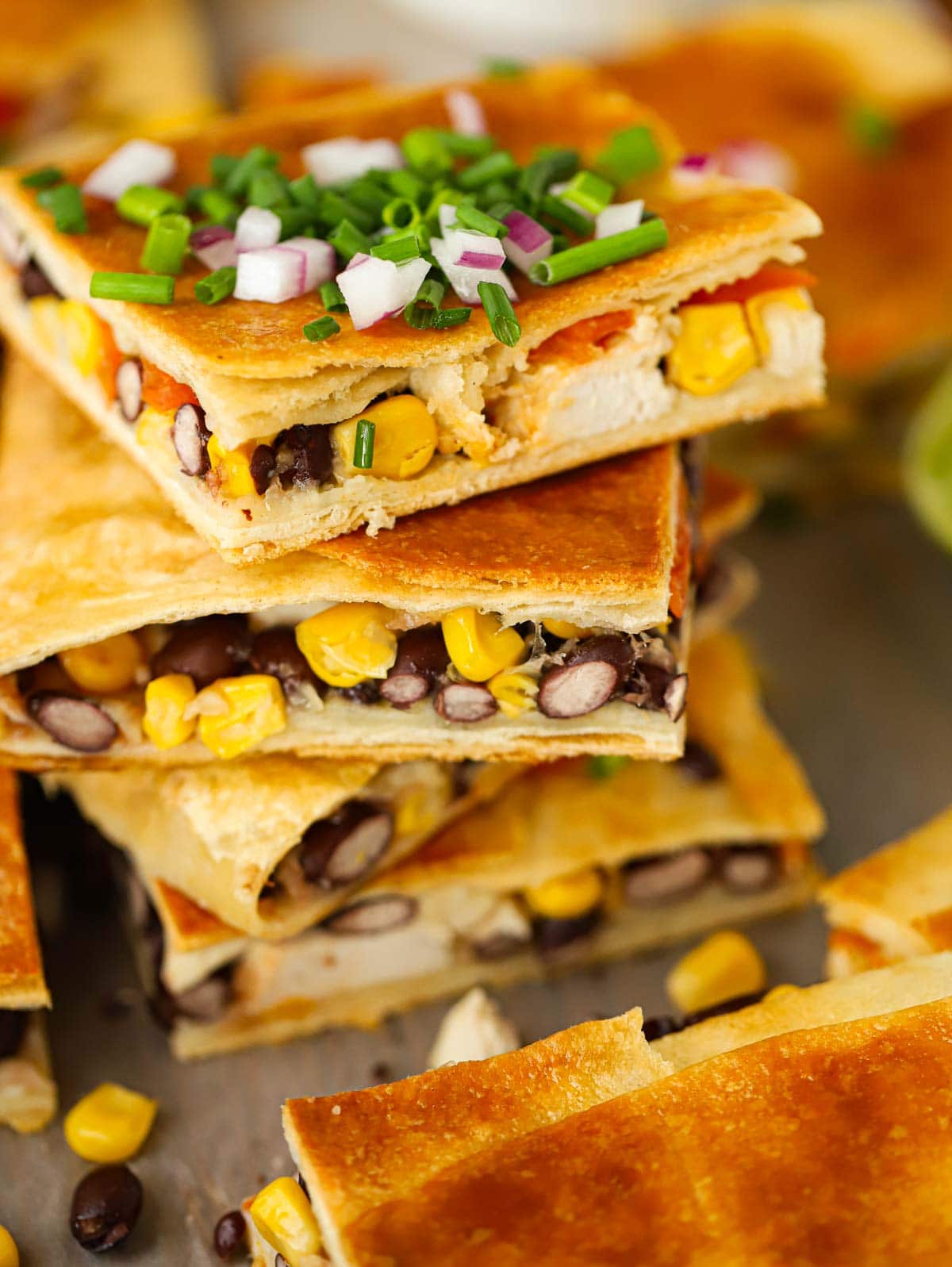 Pile of sheet pan chicken quesadillas.