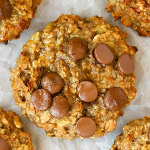 Close up of Peanut Butter Breakfast Cookie with choc chips on baking tray