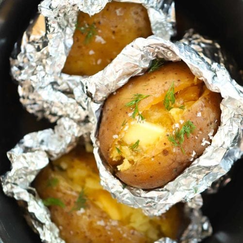 Jacket potatoes cooked in foil in the slow cooker for eight hours