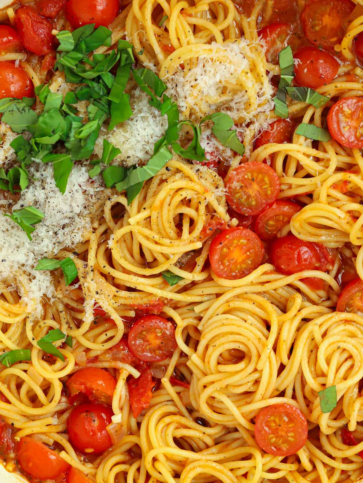 Close up of spaghetti and tomatoes in this easy one pot pasta recipe.