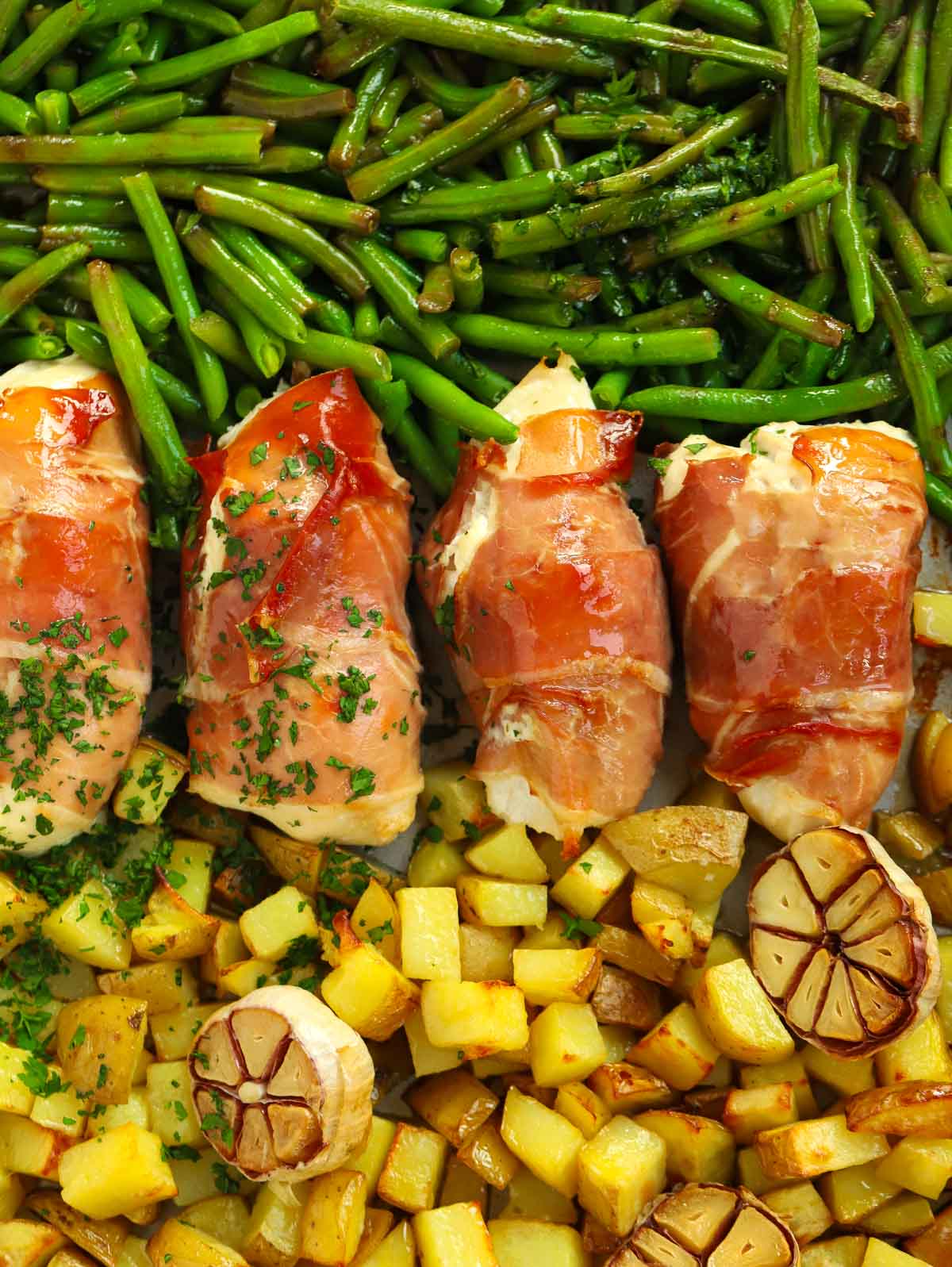 prosciutto wrapped chicken served with Parmentier potatoes and green beans. A simple family recipe