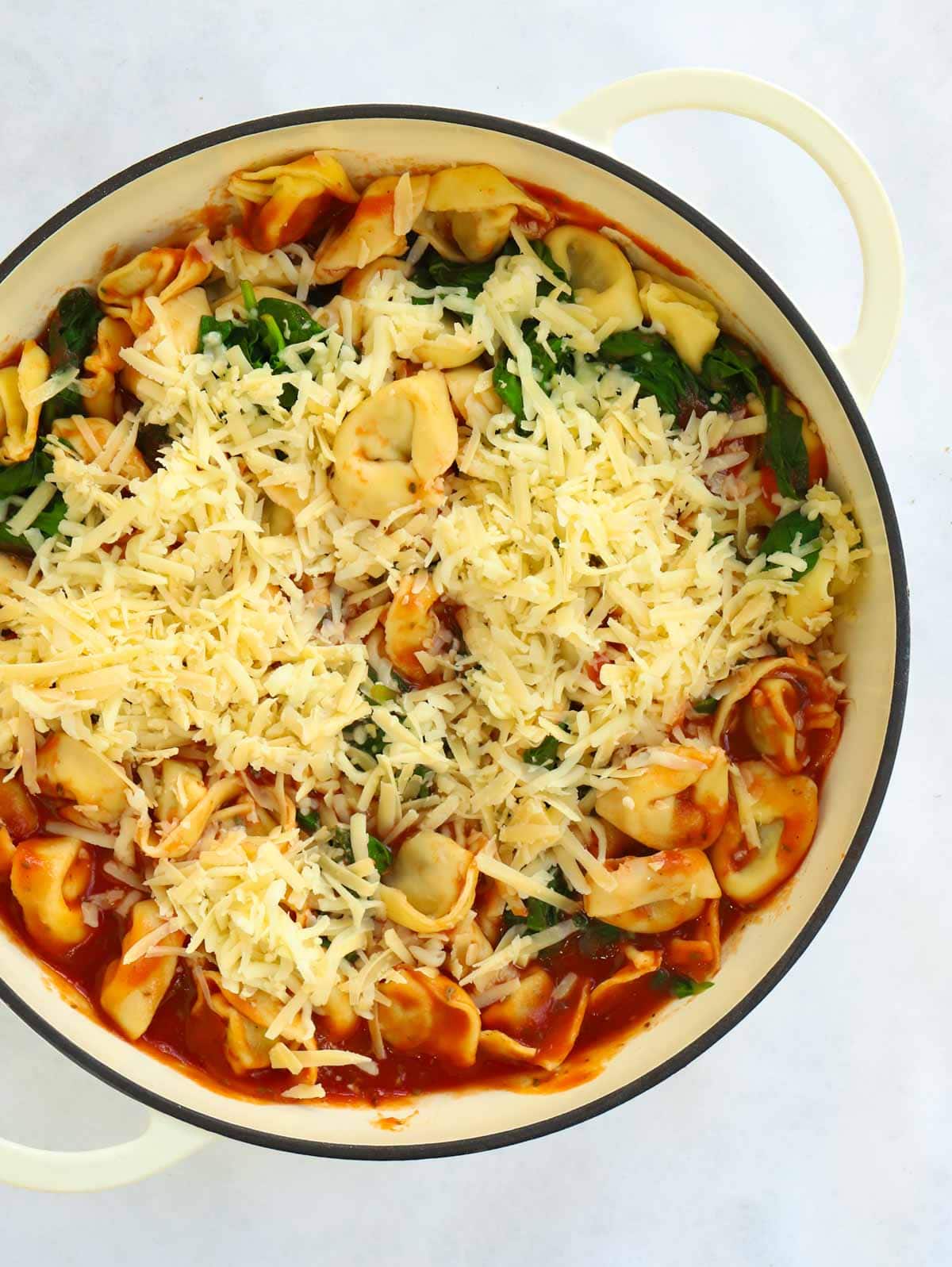 Casserole dish filled with 10 minute Spinach and Ricotta Tortellini Lasagne