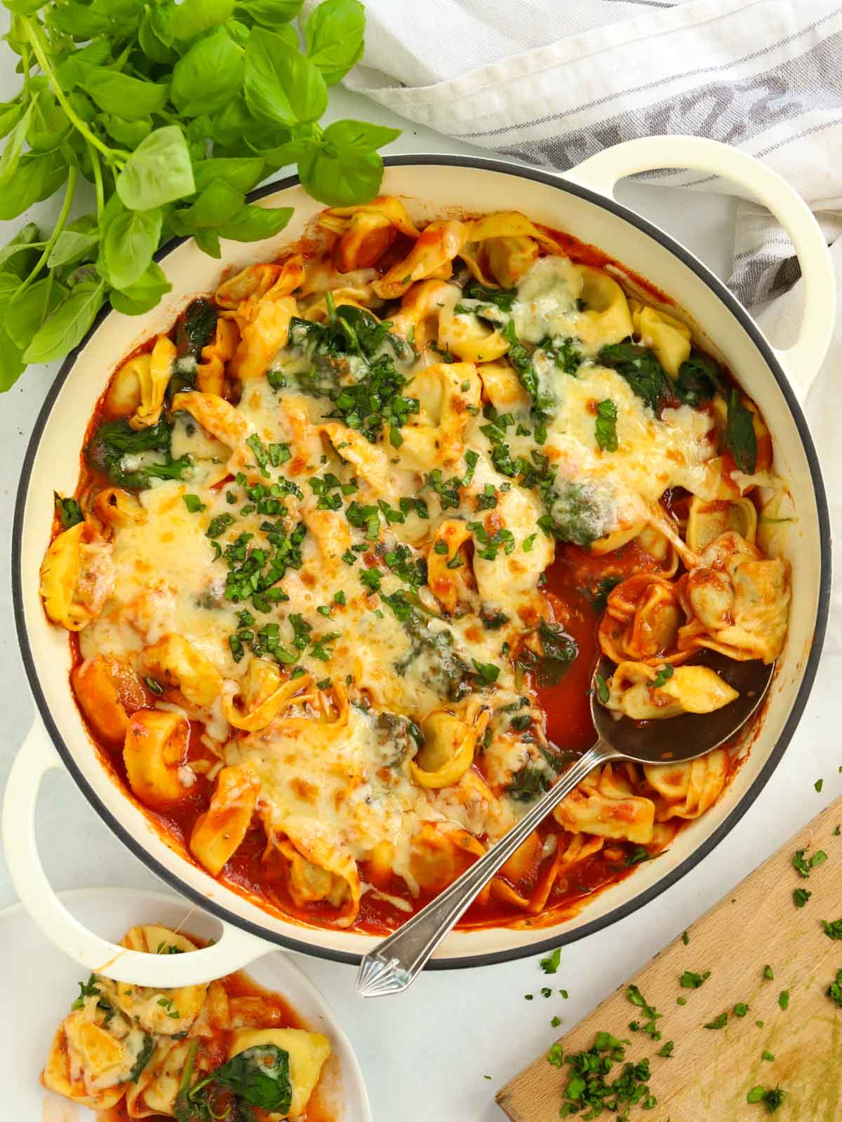 Family friendly 10 minute recipe of Tortellini Lasagne with tomato sauce.