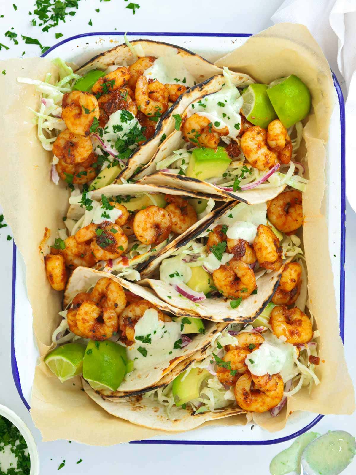 A dish full of Cajun prawn tacos for a family friendly recipe.
