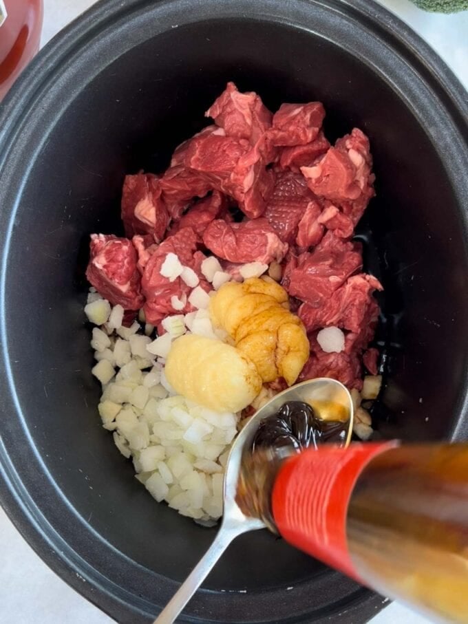 Step 1 in the recipe for Slow Cooker Beef and Broccoli.