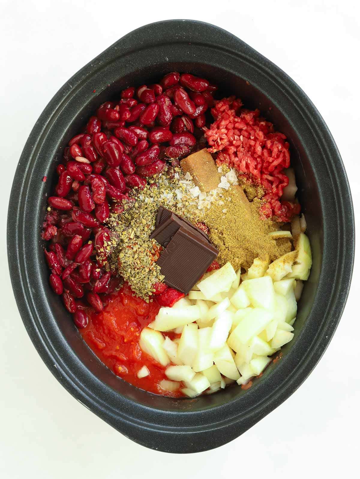 Step 1 of the recipe Slow Cooker Chilli Con Carne. Add all the ingredients to the slow cooker.