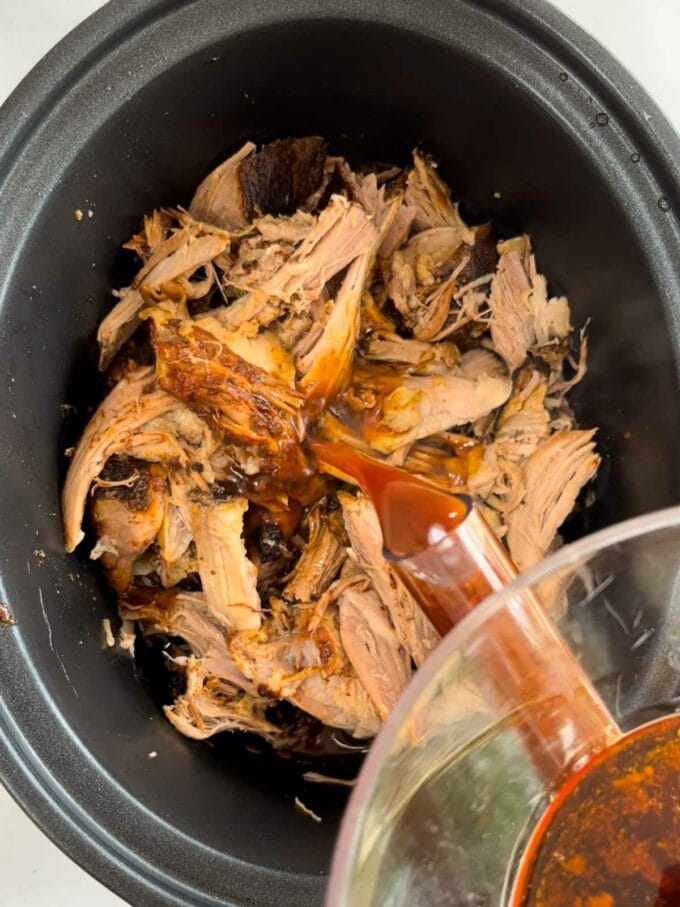 Step 4 in the recipe Slow Cooker Pulled Pork. Add juices back to the meat.