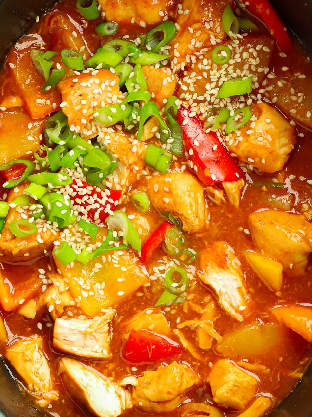 A close up of sweet and sour chicken made in the slow cooker.