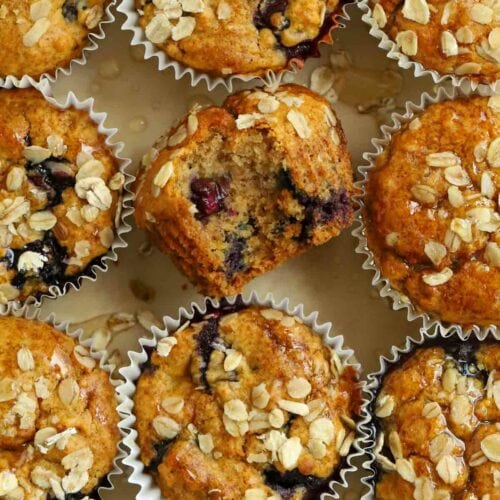 Blueberry and oat healthy breakfast muffins on a tray.