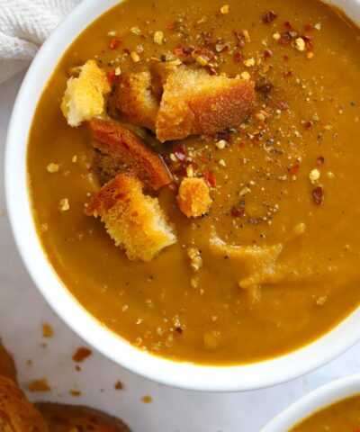 How to make Roasted Butternut Squash Soup. A big bowl of it topped with croutons.