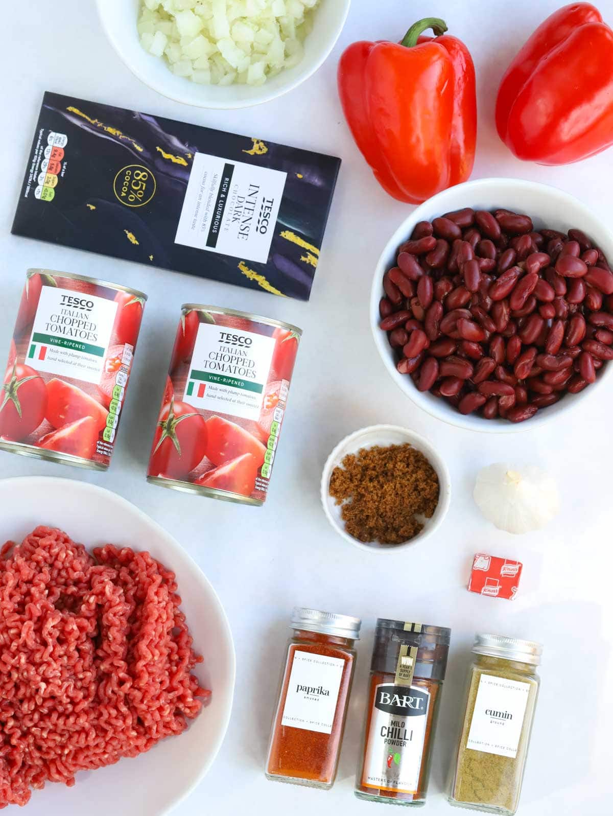Easy Chilli Con Carne recipe ingredients laid out on a counter.