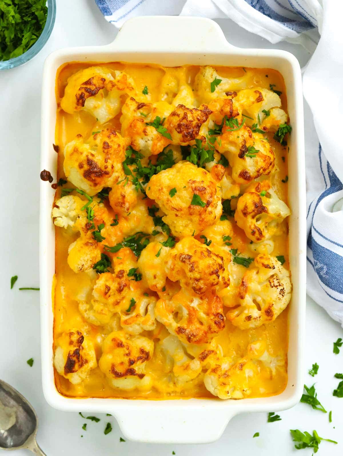 Side dish of Easy Cauliflower Cheese on a table.