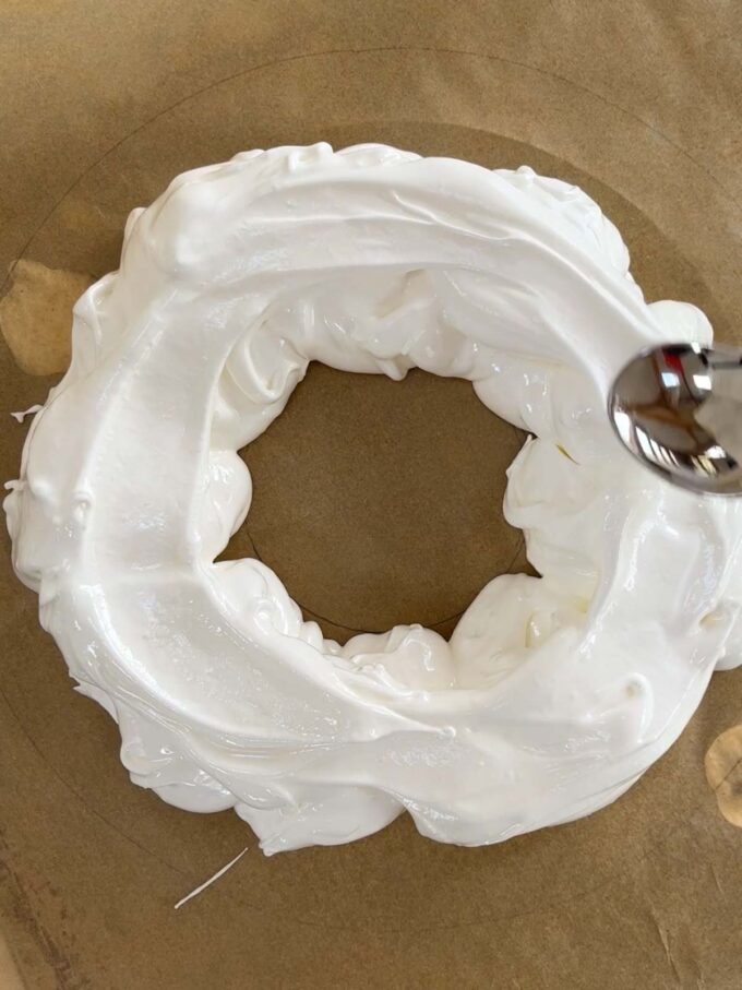 Step 5 in the recipe for Christmas Wreath Pavlova.