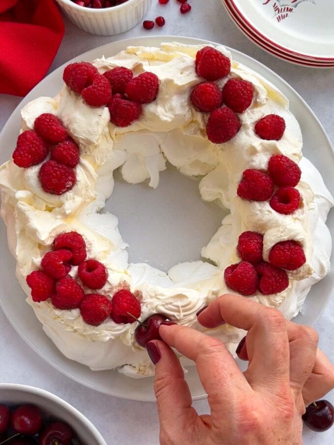 Step 6 in the recipe for Christmas Wreath Pavlova.