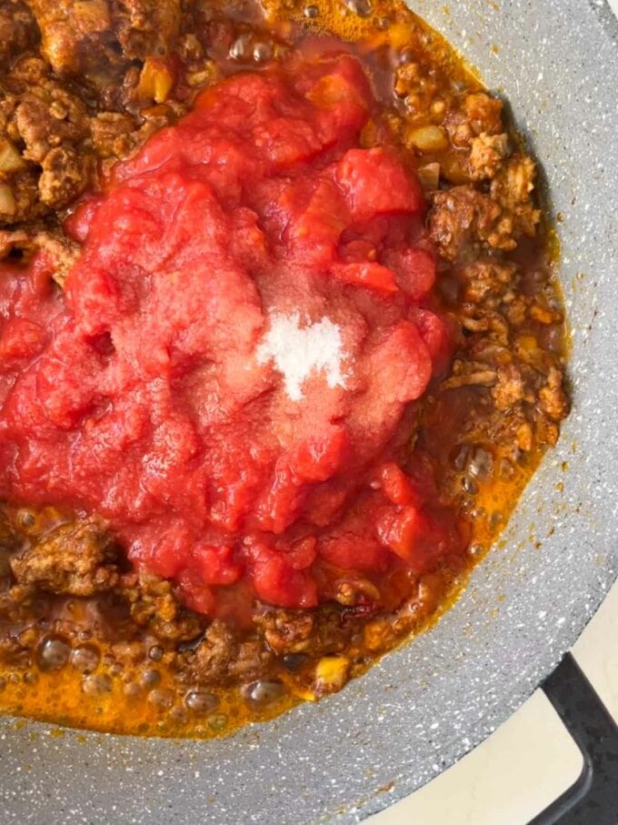 Step 2 in the process of making a lamb keema curry recipe.