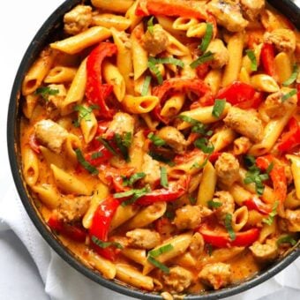 One pan full of pasta, sausage and pepper for the perfect creamy pasta dish.