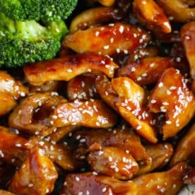 Close up of cooked Teriyaki Chicken with sesame seeds and broccoli.