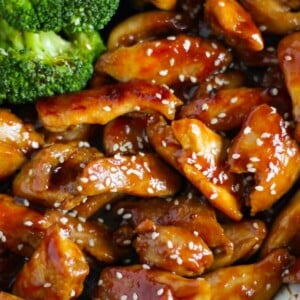 Close up of cooked Teriyaki Chicken with sesame seeds and broccoli.