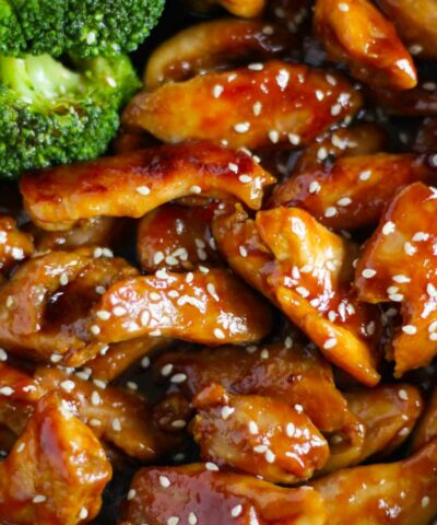 Close up of cooked Teriyaki Chicken with sesame seeds and broccoli.