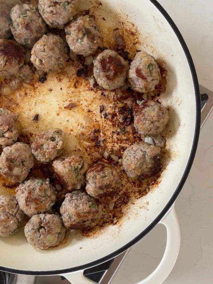 How to make Homemade Swedish Meatballs. Step 2. Meatballs frying in the pan.