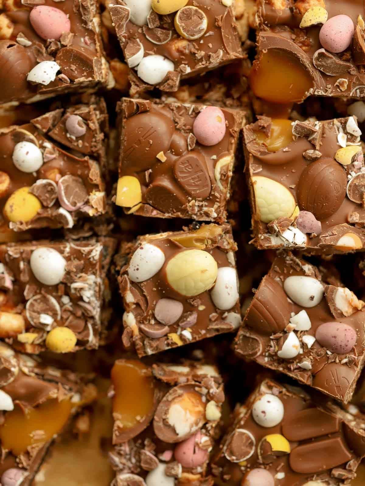 A slab of Easter Rocky Road with lots of mini eggs embedded in.