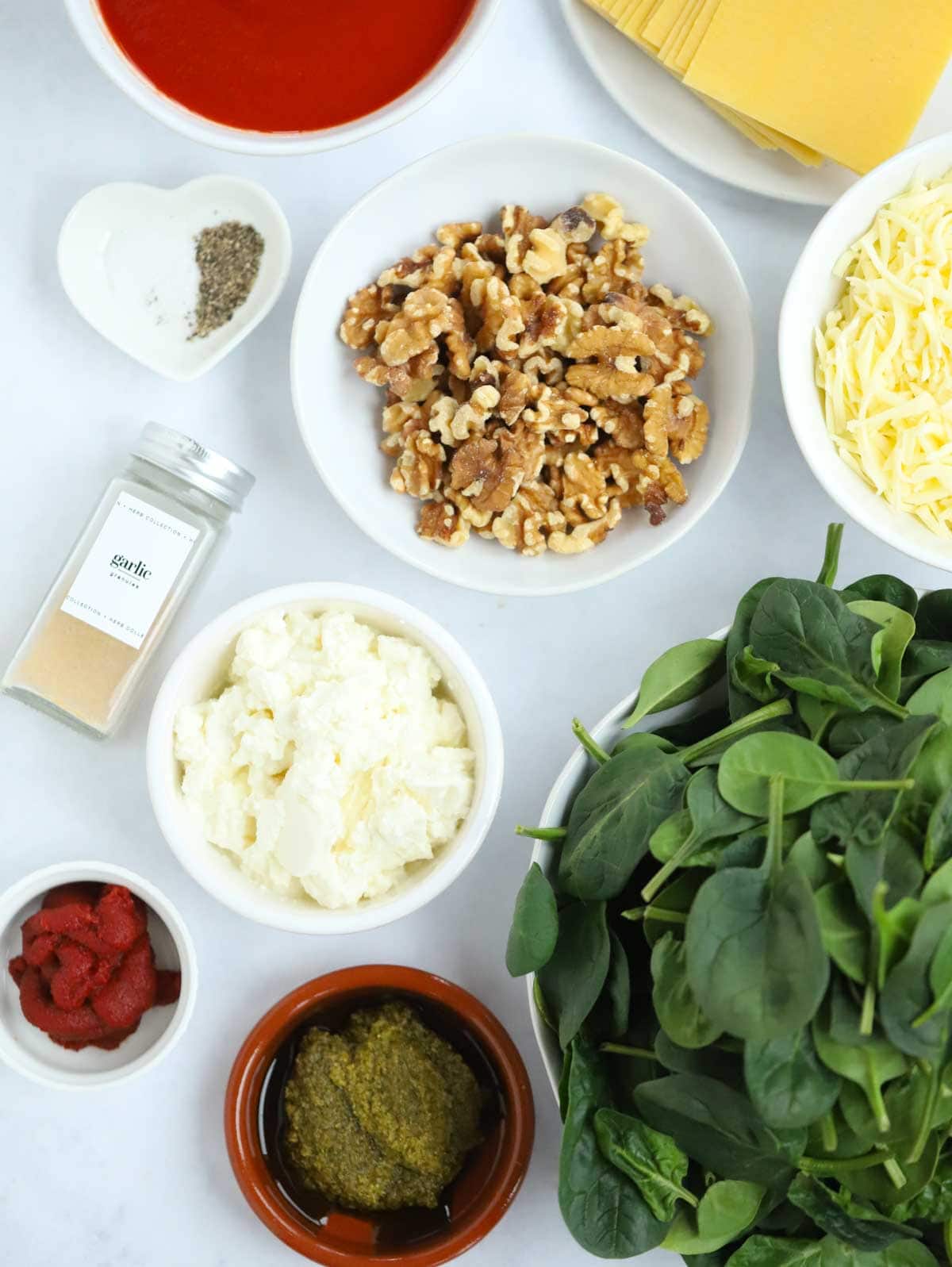 Ingredients to make spinach and ricotta lasagne.