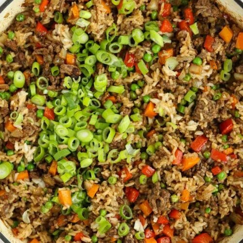 Veggies and meat for the recipe in a pot Beef Fried Rice.