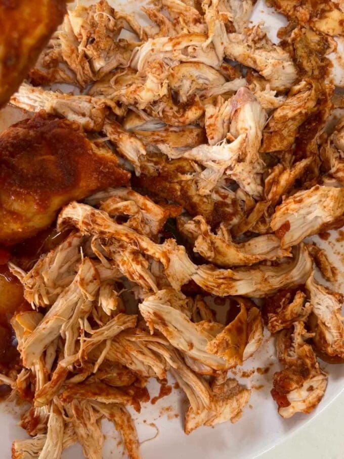 Pulled chicken torn up for the recipe Chicken Tacos.