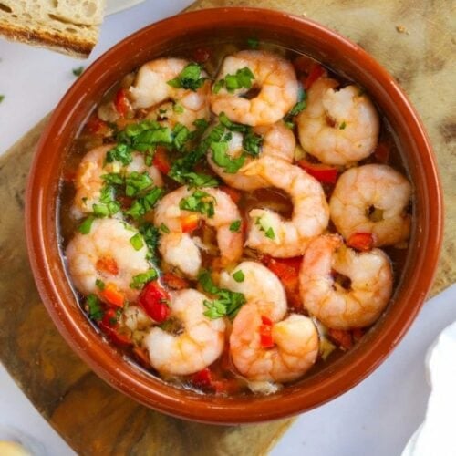 A tapas dish filled with Gambas Pil Pil. Prawns in garlic and chilli infused oil
