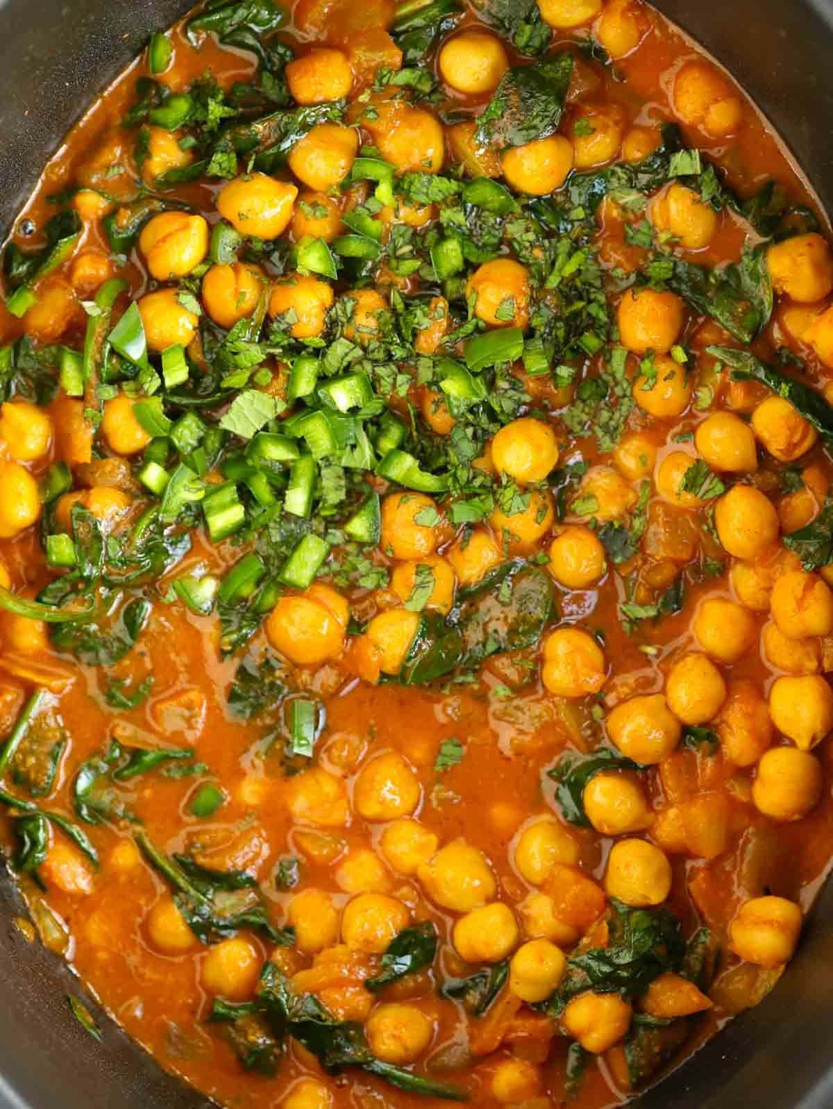 Close up of cooked Slow Cooker Chickpea Curry with Spinach.