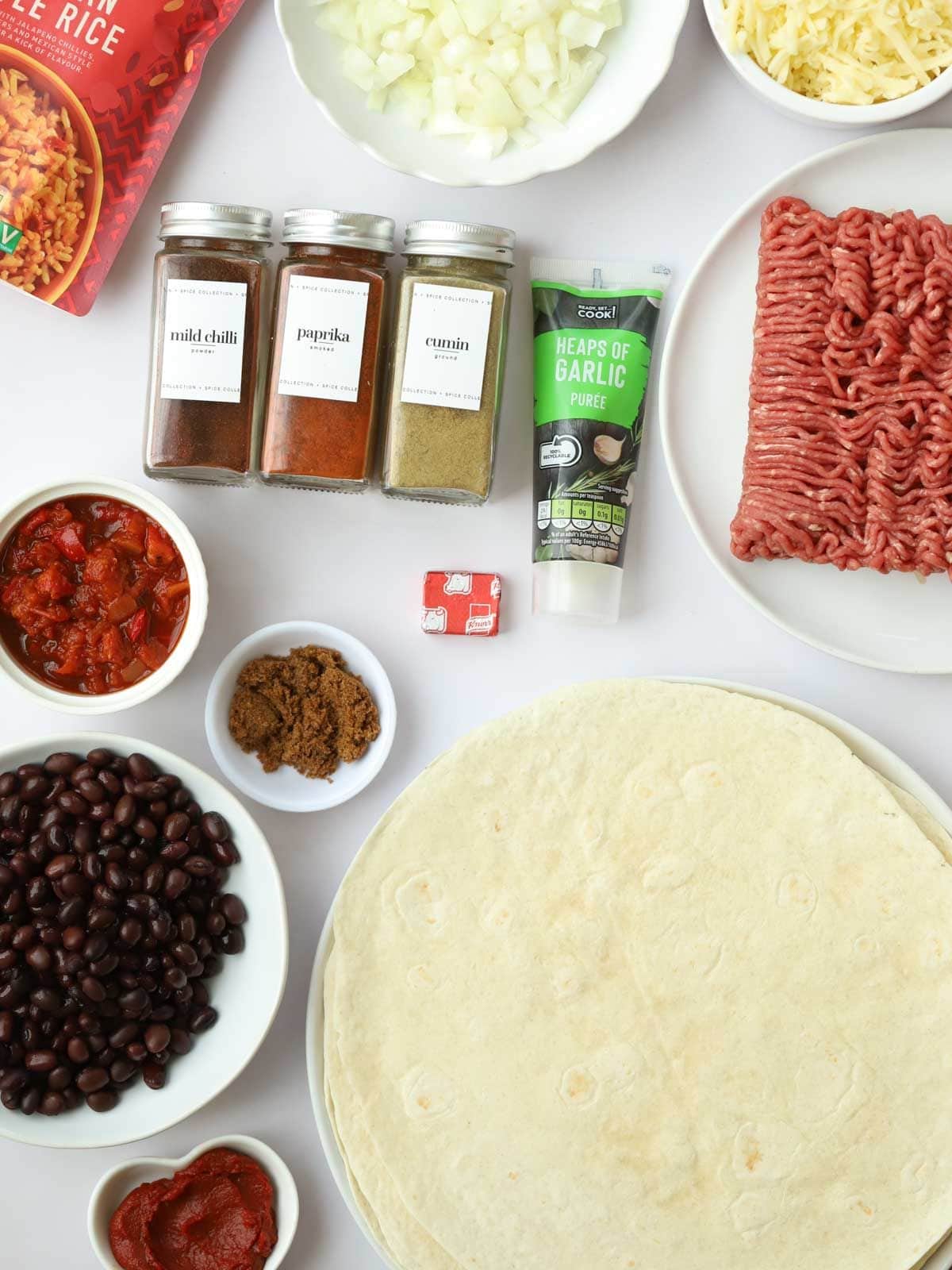 The ingredients for Beef Burritos recipe laid out on a counter top.
