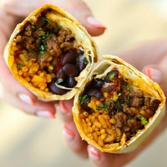 Mince beef with rice and beans inside a tortilla for a delicious beef burritos recipe.