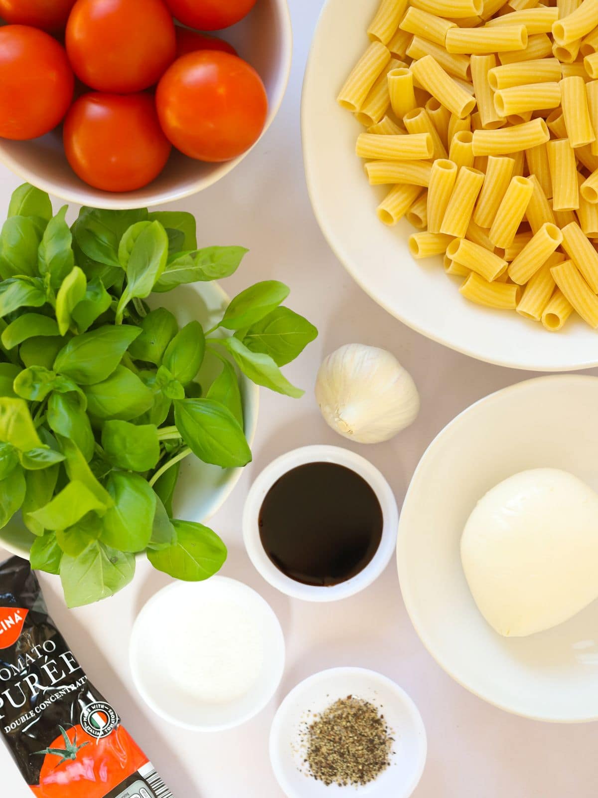 The ingredients for Tomato and Basil Pasta laid out on a counter.