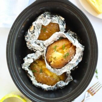 This recipe shows you how to easy it is to make slow cooker jacket potatoes.