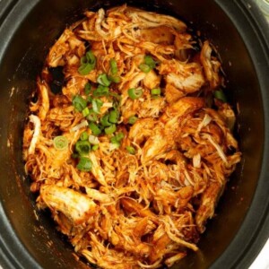 Pulled barbecue chicken cooked in a slow cooker.