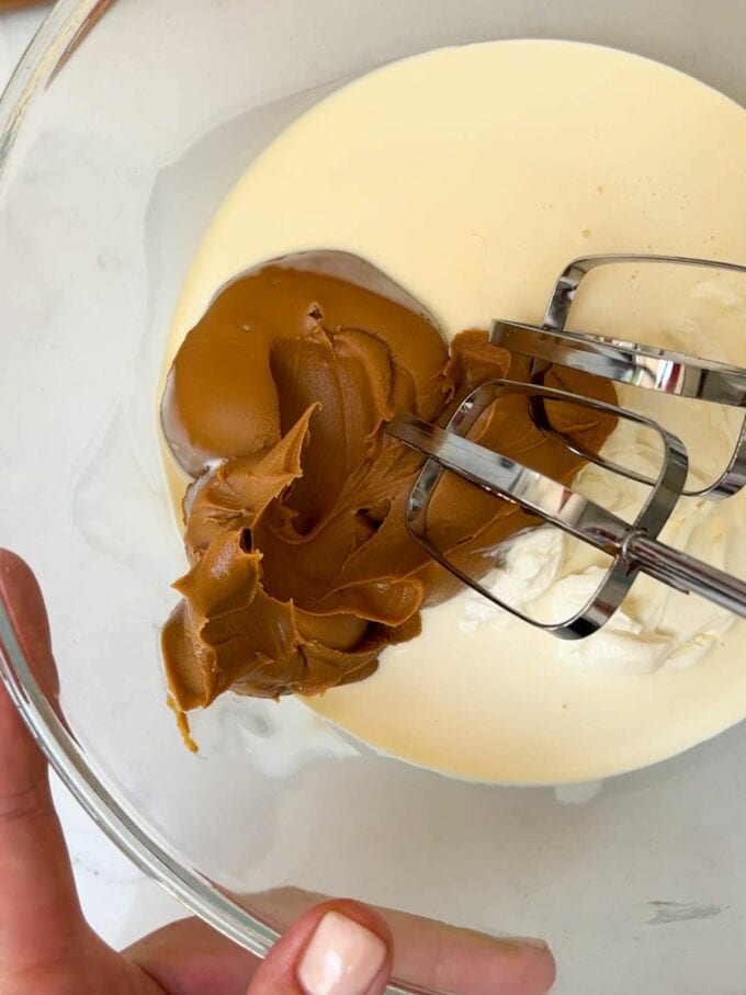How to make Biscoff Cheesecake. Step 3. Whisk the filling ingredients.