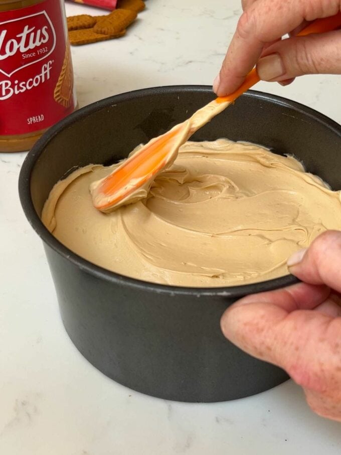 How to make Biscoff Cheesecake. Step 4. Fill the tin with mixture.
