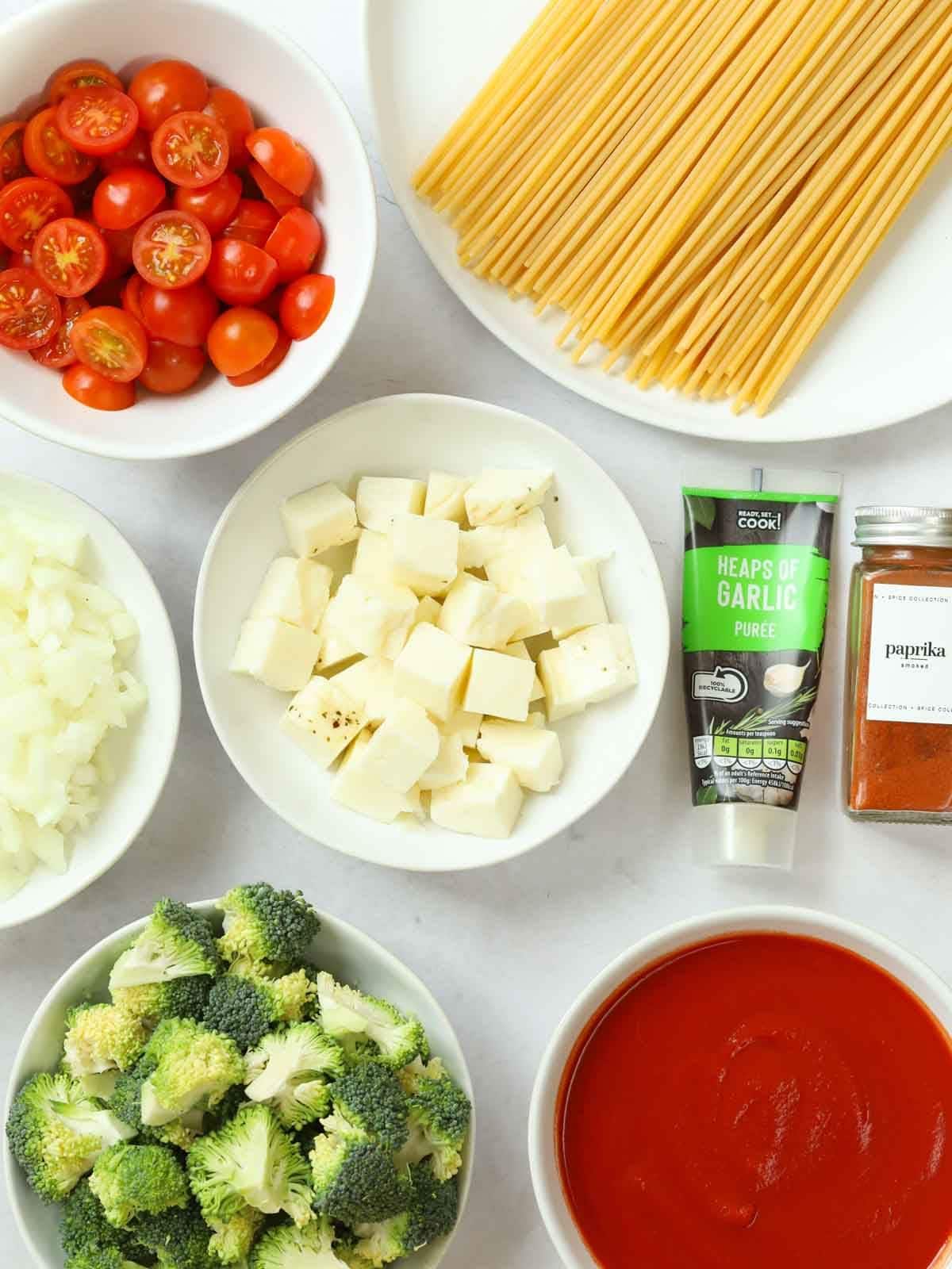 Ingredients for Halloumi Pasta laid out on a counter.