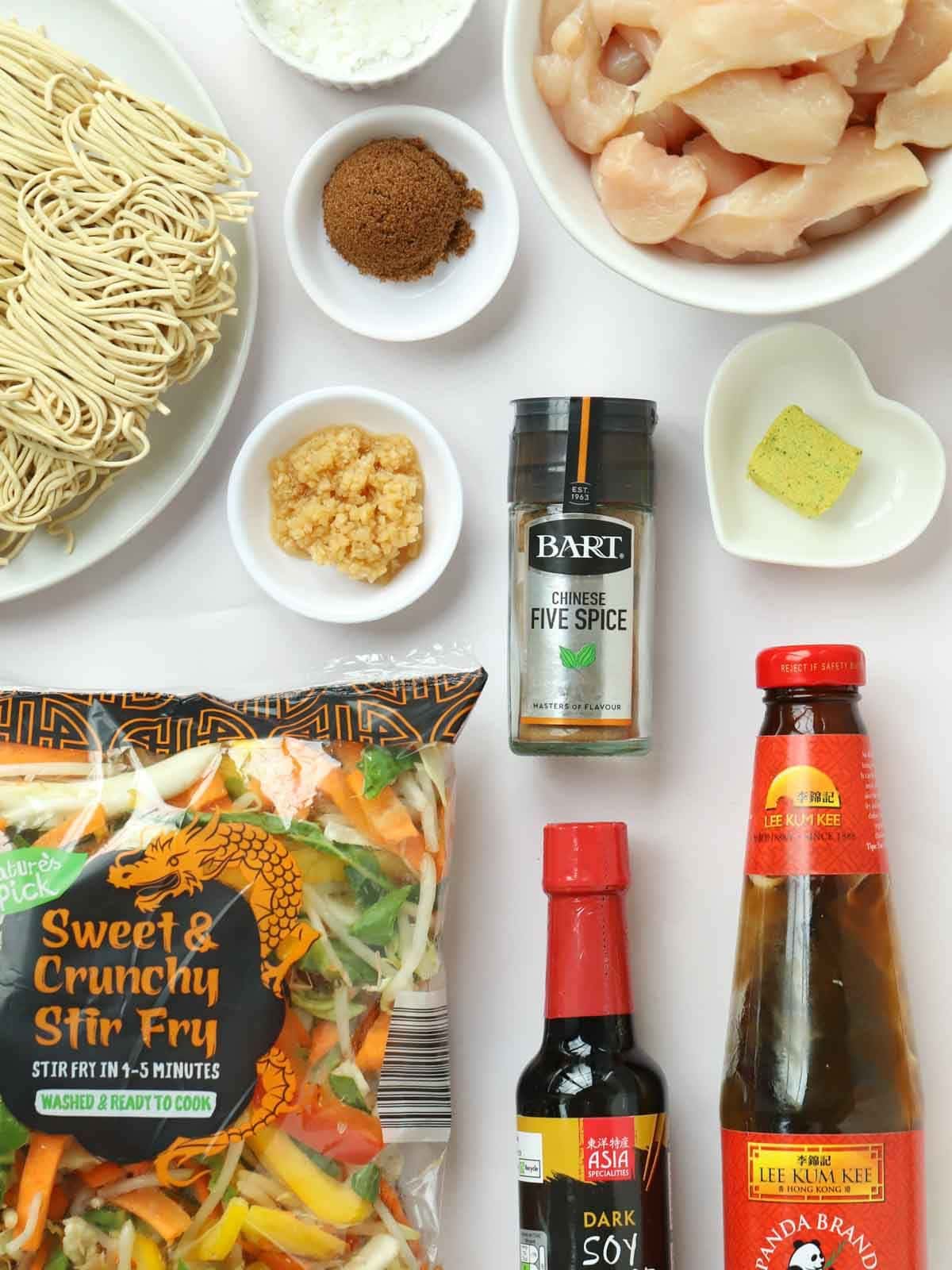 The ingredients for an easy chicken chow mien recipe all laid out on the counter.