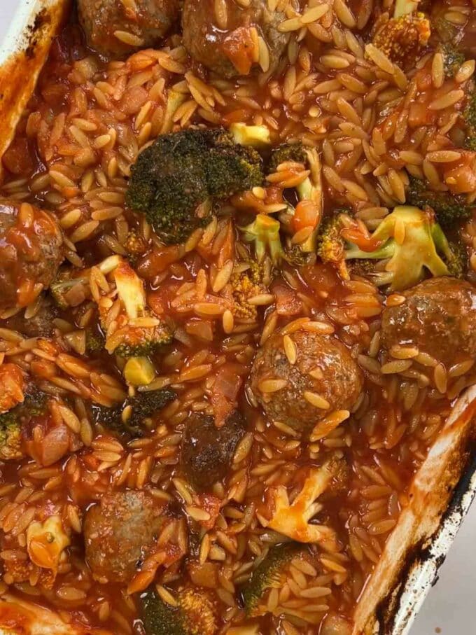 How to make Meatball Orzo Bake, step 3. Cooked orzo, meatballs and broccoli cooked in a dish.