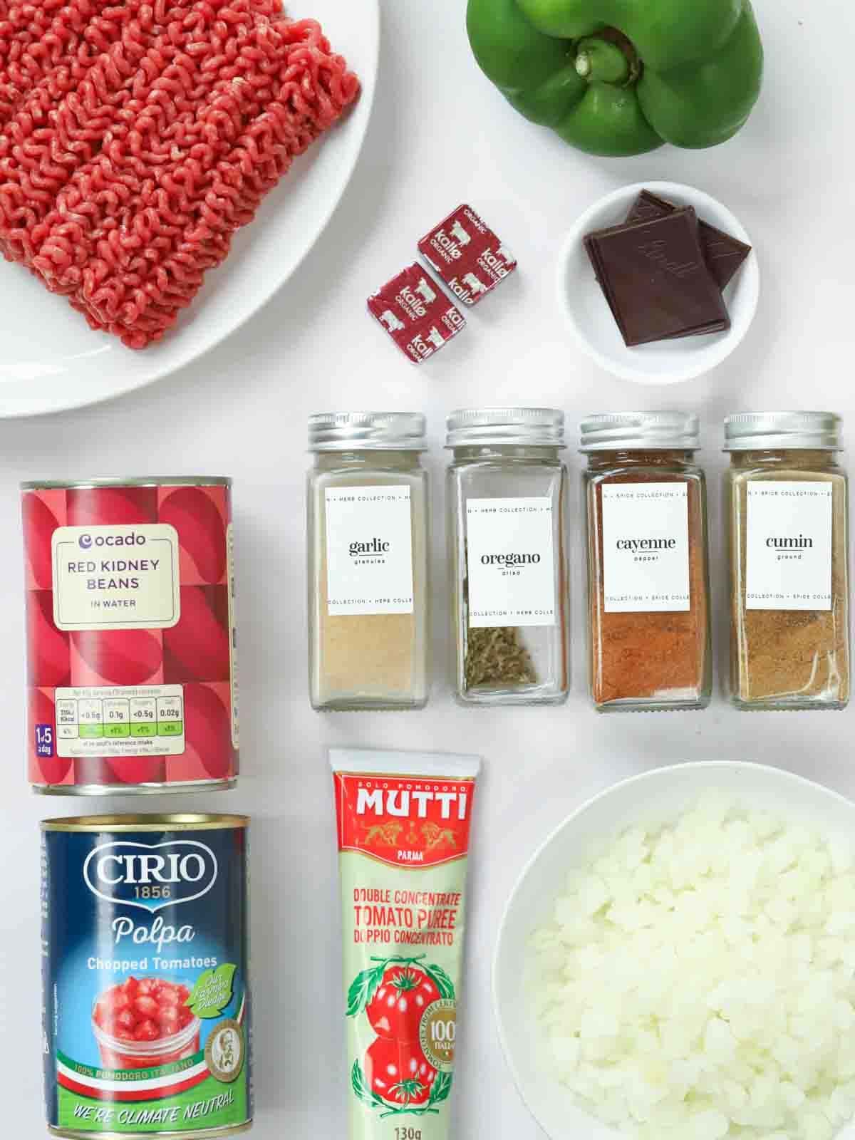 Ingredients for slow cooker chilli laid out on a counter top.