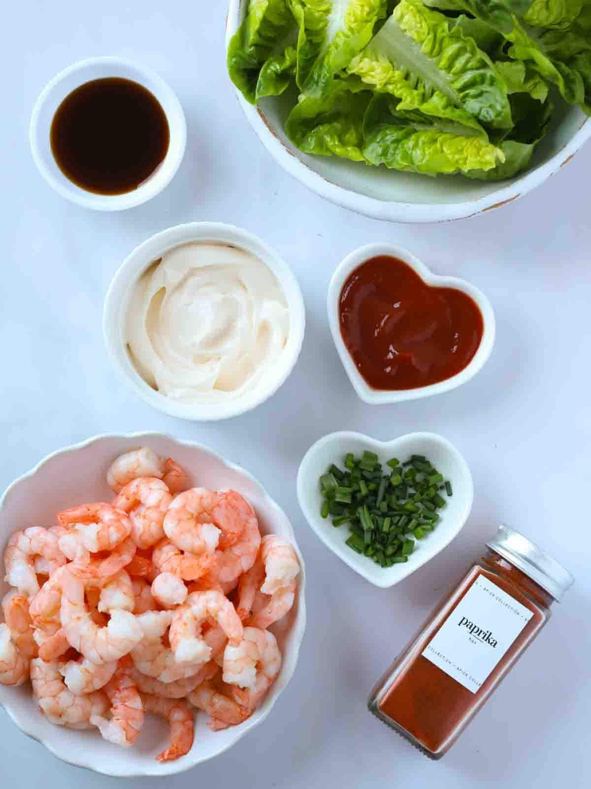 The ingredients for a prawn cocktail canapés recipe laid out on a counter top.