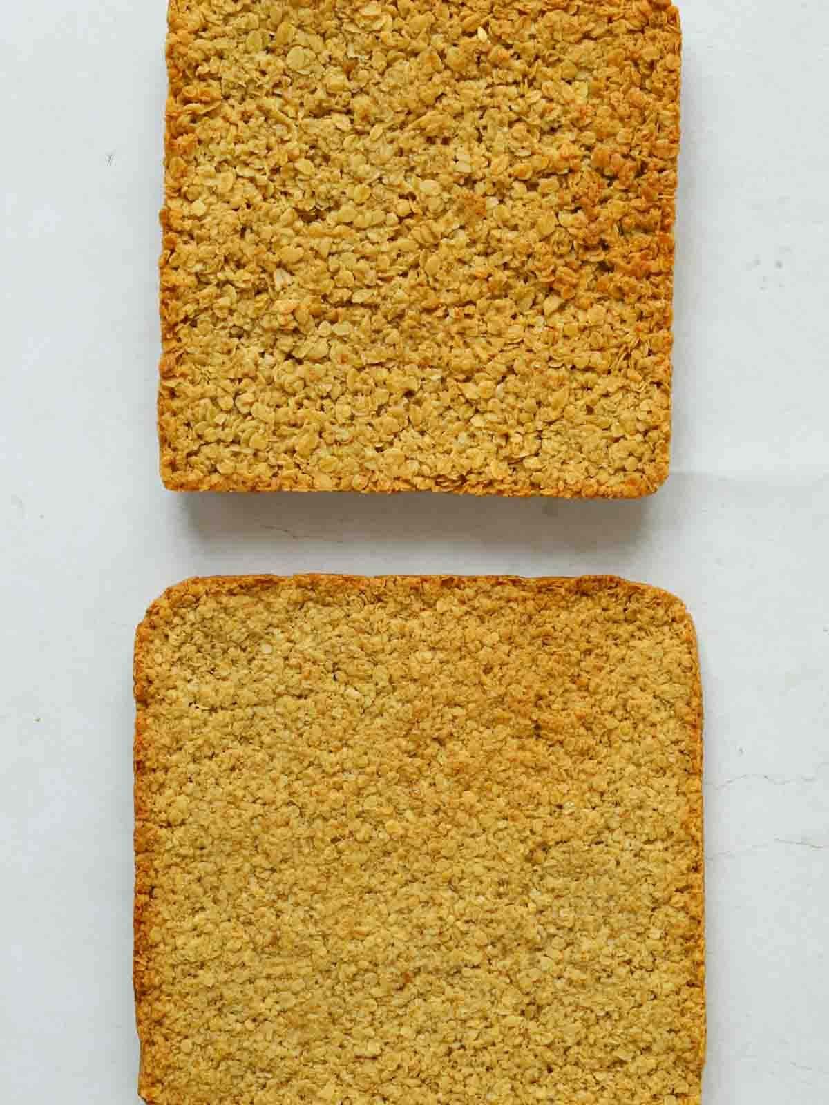 Two slabs of baked flapjack, showing the difference between using just rolled oats and using half rolled and half jumbo oats.