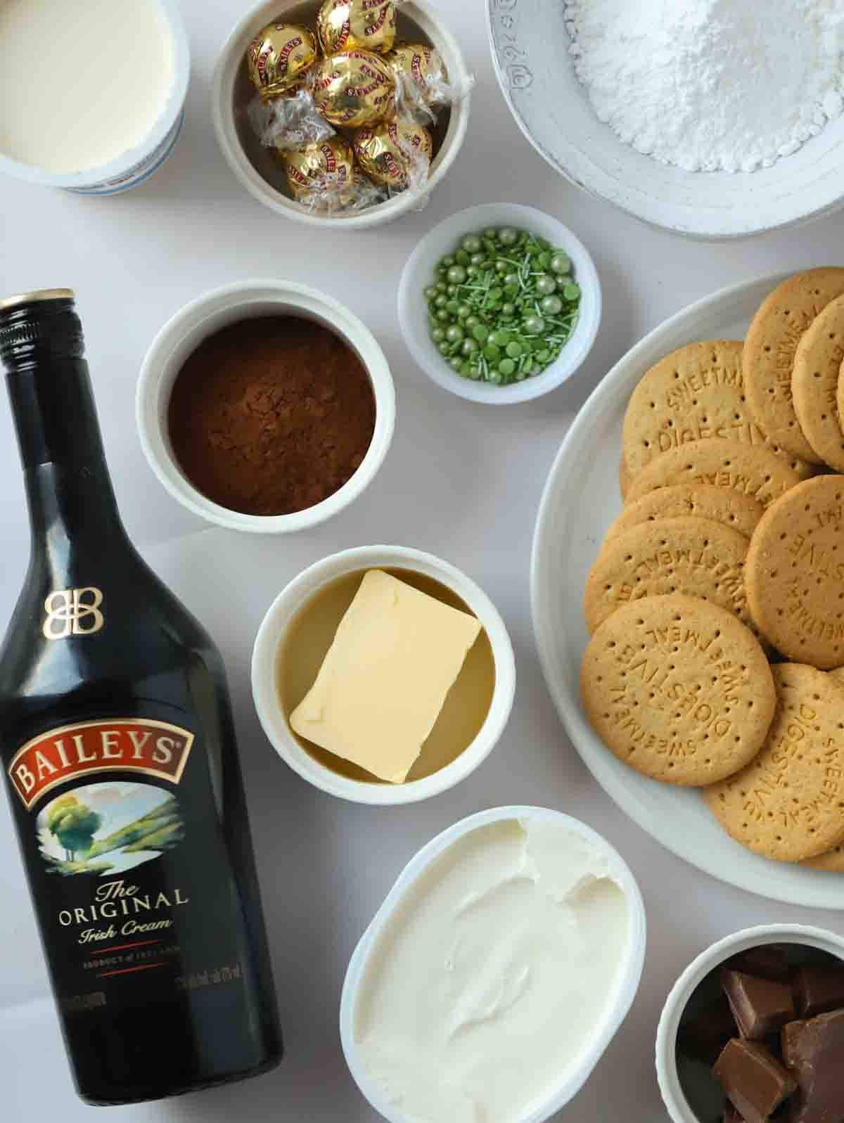 Ingredients for Baileys Cheesecake laid out on a counter.