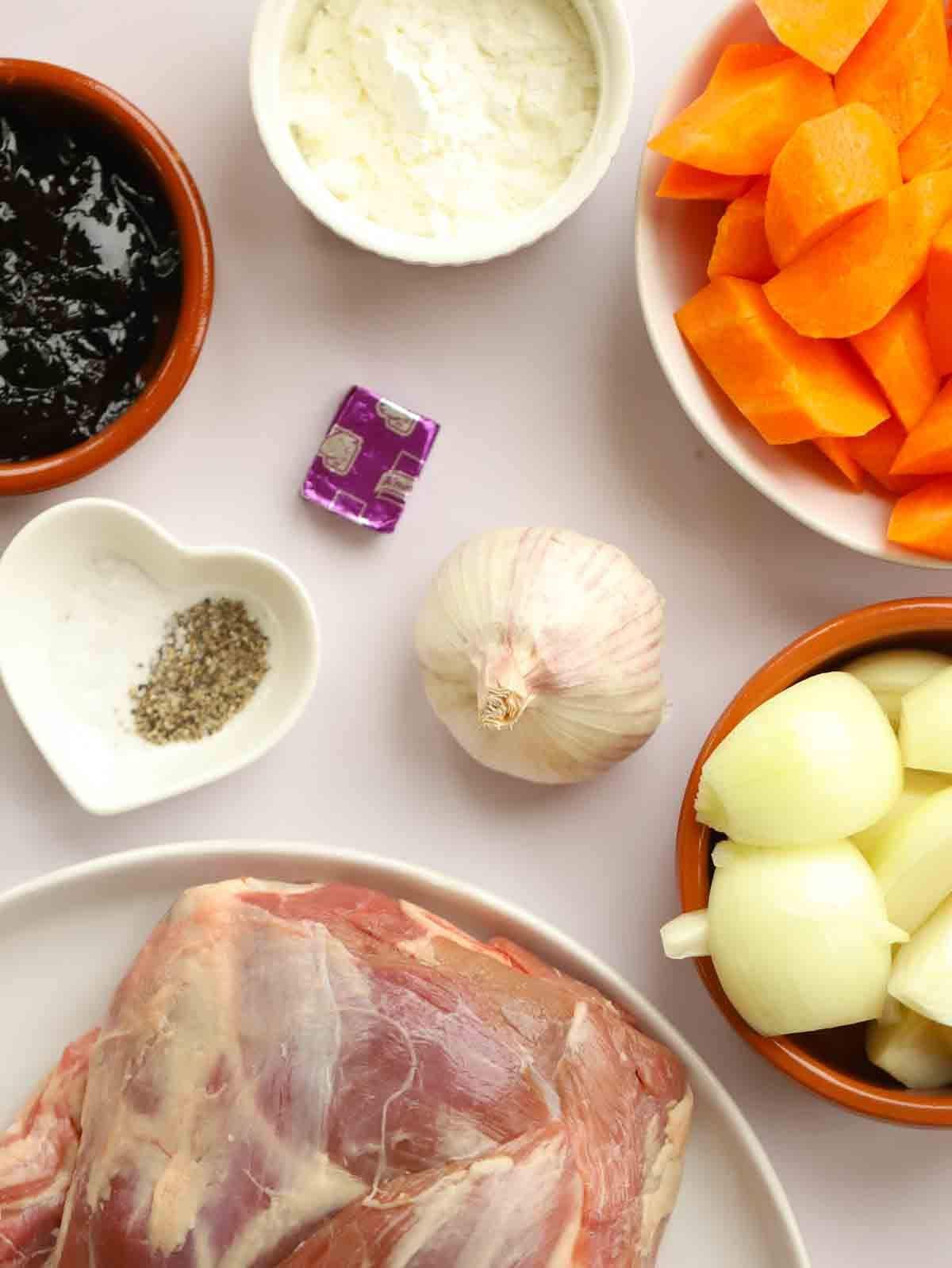 The ingredients for slow cooker roast lamb laid out on a counter top.
